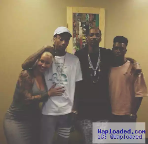 Amber Rose poses with her ex-Wiz Khalifa and Snoop Dogg